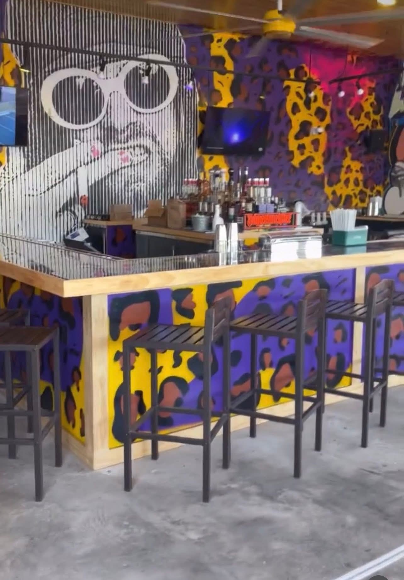 Custom outdoor bar build with painted finishes
